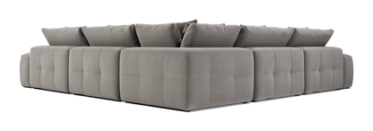 Introducing the Fullerton Modular Sofa 04: a spacious, plush sofa in light gray with a quilted design. This contemporary L-shaped sectional features deep seating and multiple cushions for ultimate comfort.