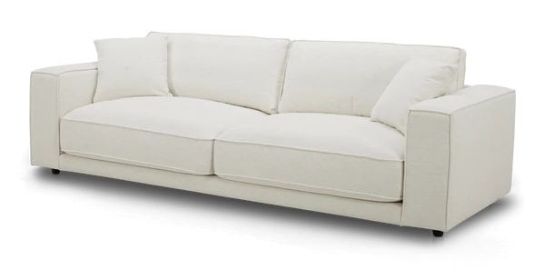 Experience the Elmore Sofa, a modern white piece featuring two large cushions and a minimalist design, beautifully showcased against a plain background.