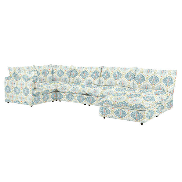 The Keaton 6 Piece Modular U Shaped Sectional is a spacious sofa with a large L-shaped design, featuring plush cushions and adorned with a blue, gray, and white geometric floral pattern set against a white background.