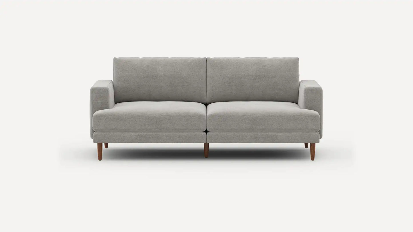 Introducing the Ember Mid-Century Modern 75" Sofa: a sleek gray sofa with a minimalist design, complete with two seat cushions and backrests. It features slim, straight armrests and wooden legs, beautifully showcased against a plain white background.