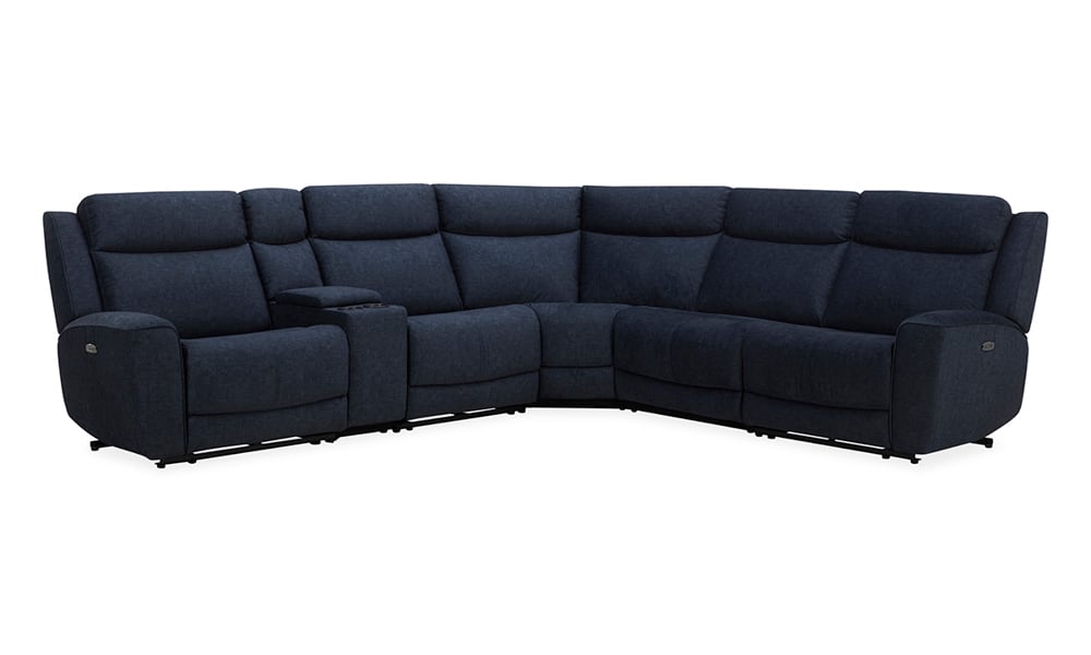 Introducing the Palmeri Denim Power 6-Piece Sectional: a dark blue sectional sofa designed for modern living rooms, featuring plush cushions and ample seating for ultimate comfort. It includes two armrests and a central console, perfect for storing items or holding drinks.